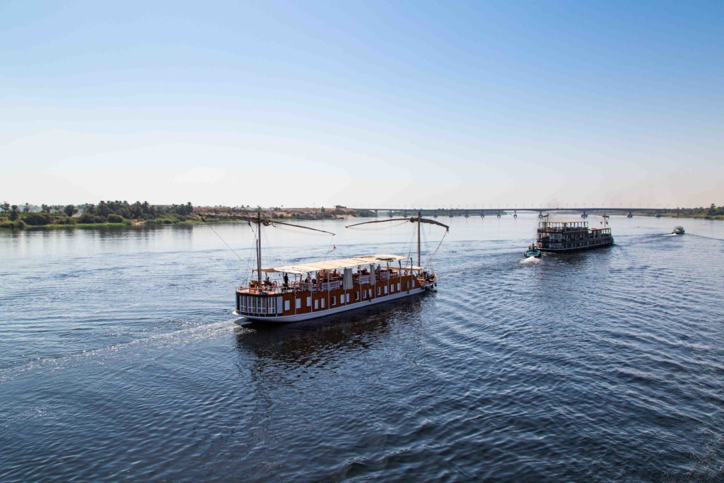 Other Nile boats being assisted upstream.