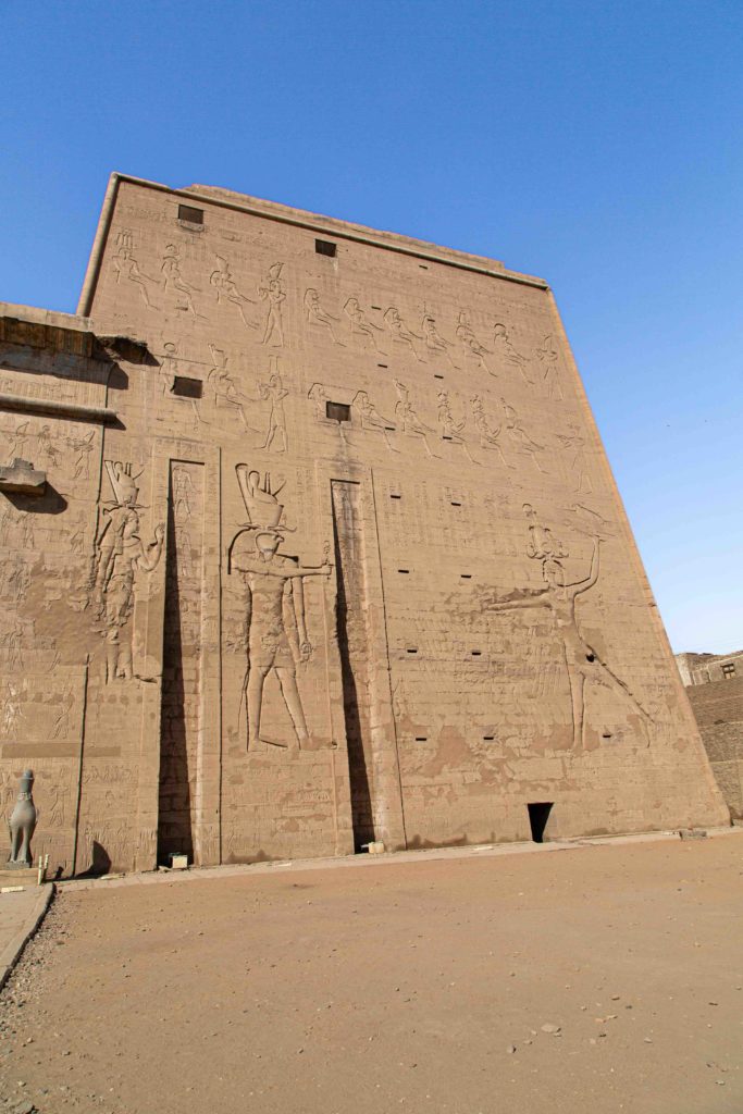 The pylons show scenes of Ptolemy XII conquering his enemies and worshiping the egyptian gods.