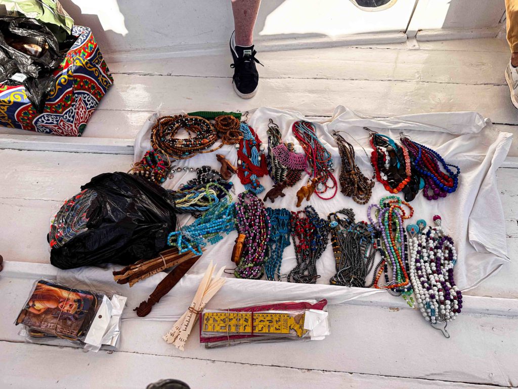 Ayman displayed goods made by. his family during the sail. We purchased a few.